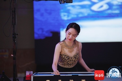 自贸港的年轻人 | "南海工匠"何素丹用沙画绘出海南故事